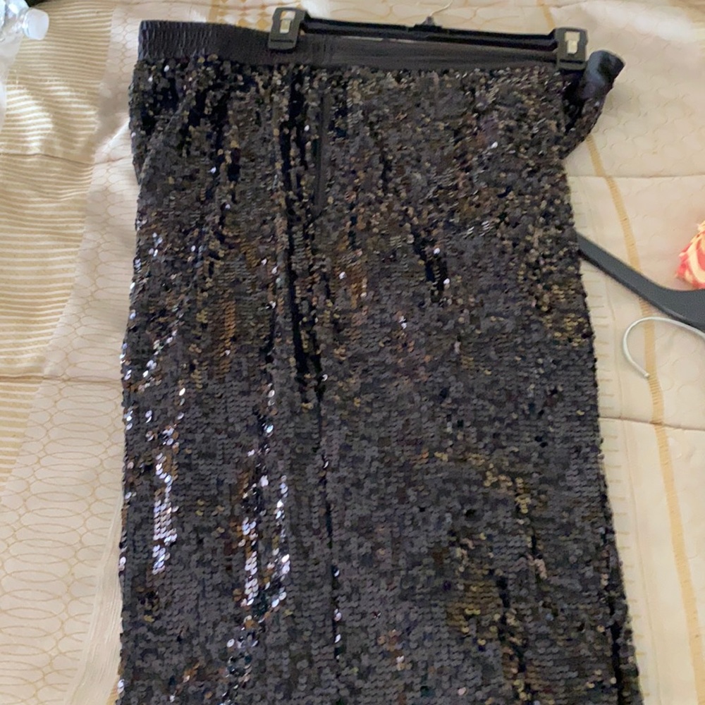 Full length wide leg black sequence pants .